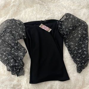 Black top with sheer sleeves
